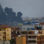 Smoke rises above the Sudanese capital on Monday